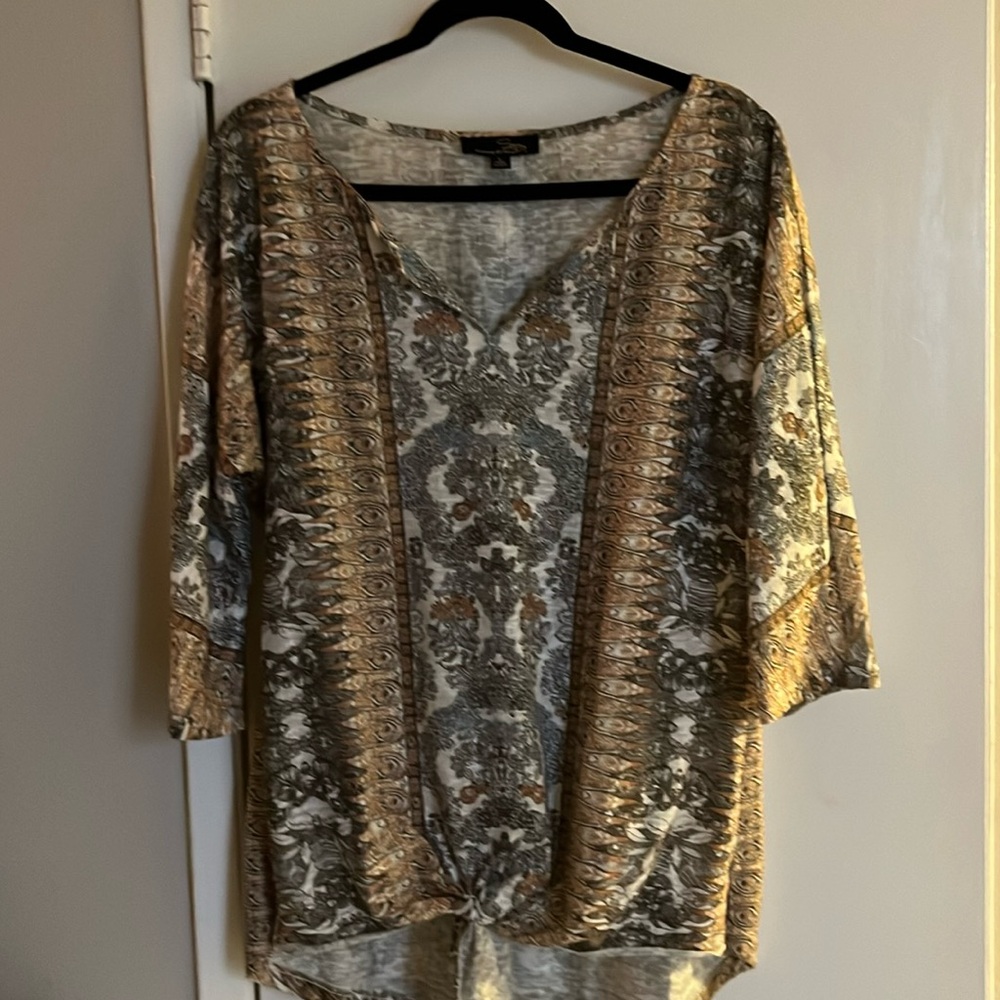 Light sweater, blouse that is really flattering